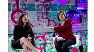 Allison Shapira seated on stage during an interview at the Fortune Most Powerful Women Conference, alongside the interviewer.